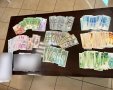 הכסף שתפסה המשטרה בביתו של אחד החשודים